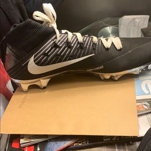 black and white speed cleats